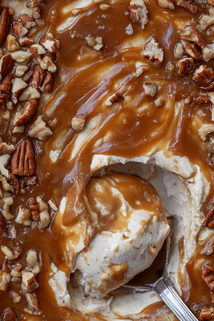 Creamy easy caramel apple cheesecake dip topped with rich caramel and chopped pecans.