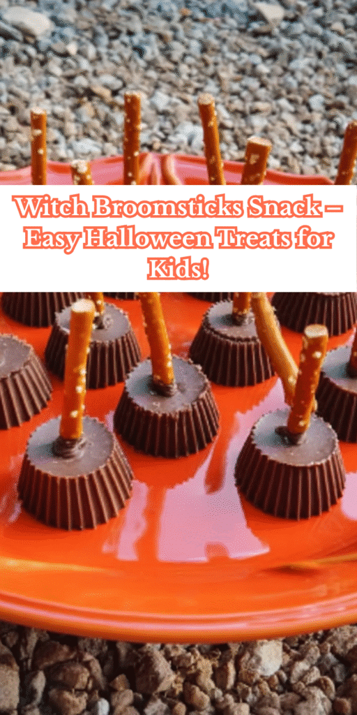 Mini chocolate Witch’s Broomsticks made from peanut butter cups and pretzels on an orange plate.