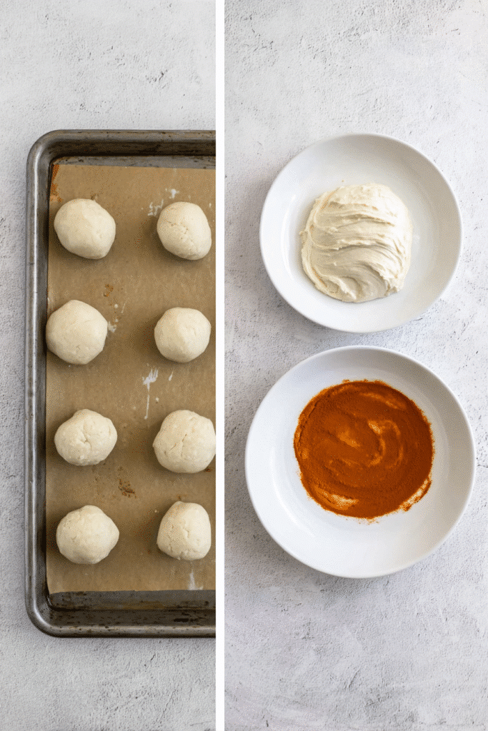 Overhead view of cheesecake filling scoops on a tray and a plate of cinnamon sugar, showing preparation steps for pumpkin cheesecake snickerdoodles.