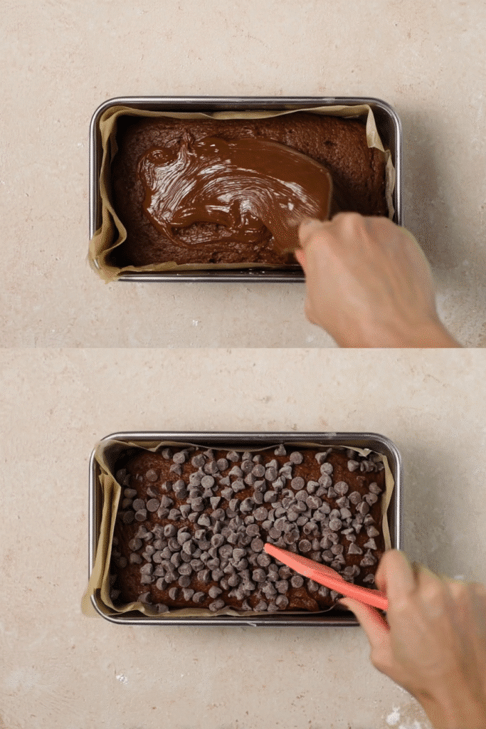 Pouring chocolate pumpkin bread batter into a loaf pan and topping with chocolate chips.