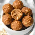 Chewy pumpkin protein balls packed with oats and nutty flavor perfect for a healthy fall snack.