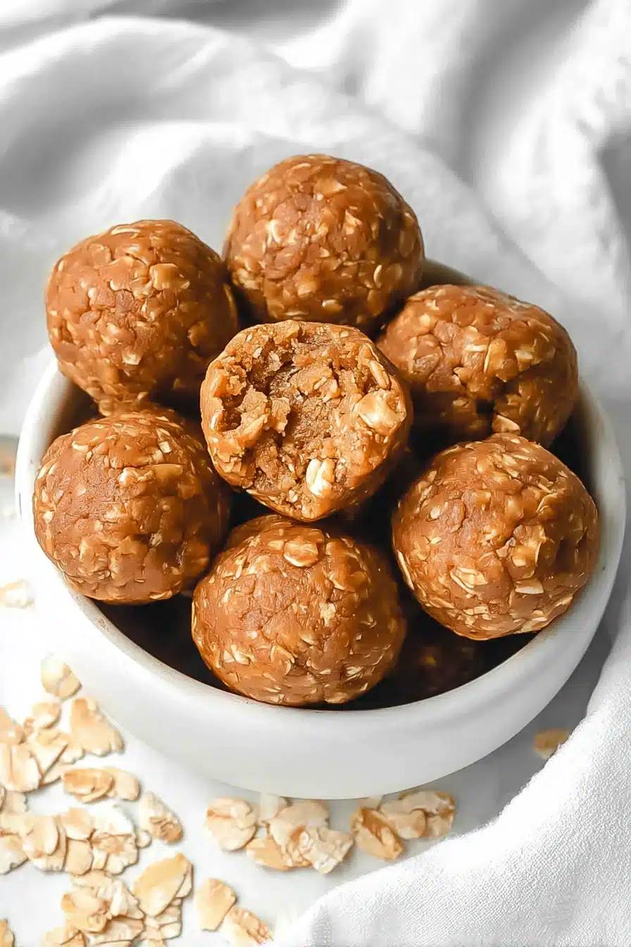 Chewy pumpkin protein balls packed with oats and nutty flavor perfect for a healthy fall snack.