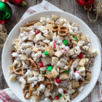 gluten free reindeer chow on holiday plate with ornaments