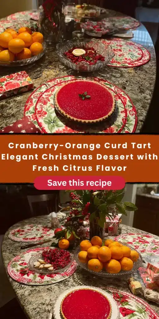 Cranberry-orange curd tart on a table with oranges and cranberries. Christmas dessert.