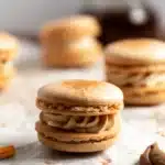 pumpkin pie macarons filled with creamy spiced buttercream