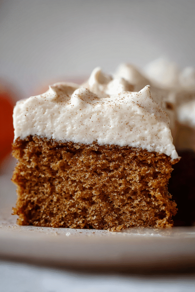 thanksgiving resource guide spiced cake slice with cream frosting