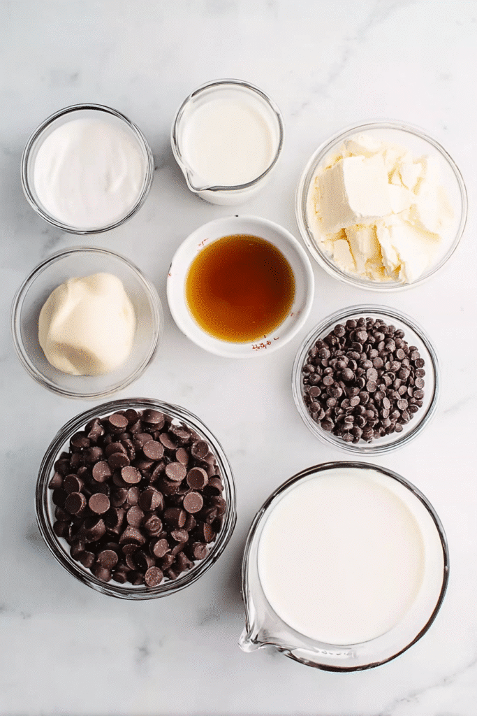 ingredients for the best crockpot hot chocolate on marble surface