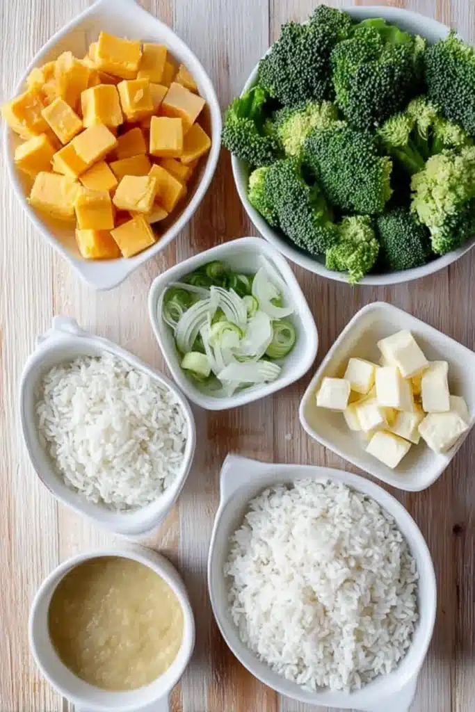 Ingredients for broccoli cheese rice casserole in white bowls