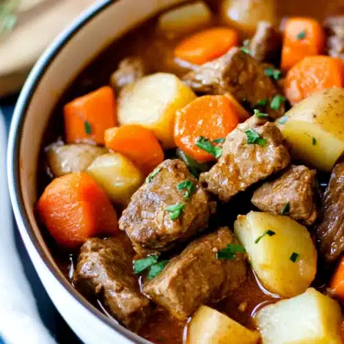 A delicious crock pot beef stew with vegetables and rich flavors.