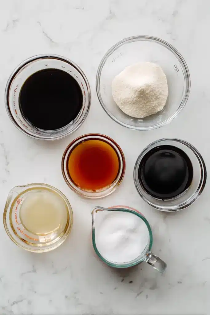 Sauce ingredients for Chinese beef and broccoli on white counter