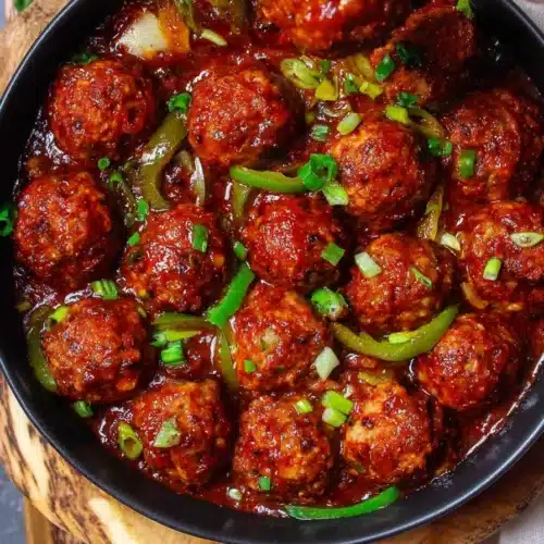 cabbage manchurian recipe with spicy sauce and spring onion