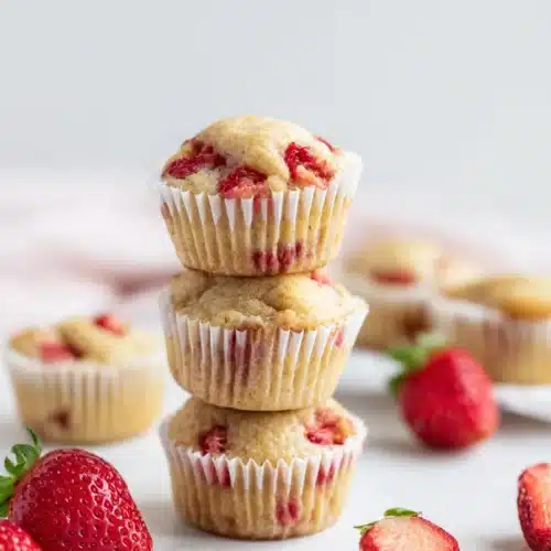 These fluffy strawberry banana mini muffins are made with wholesome ingredients and no refined sugar. Perfect for baby-led weaning, toddler snacks, or healthy meal prep.