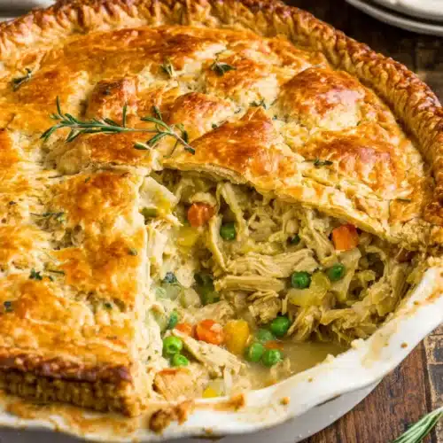 Chicken pot pie recipe with a flaky crust and creamy filling.