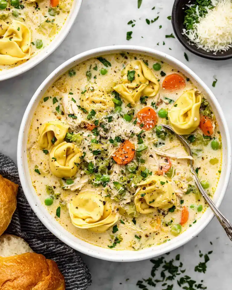 Delicious Chicken Tortellini Soup Recipe Creamy chicken tortellini soup with veggies and Parmesan.