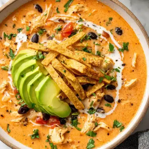 Creamy chicken tortilla soup perfect for winter comfort.