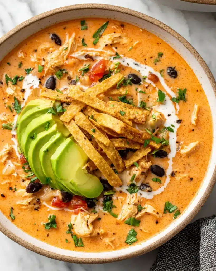 Creamy chicken tortilla soup perfect for winter comfort.