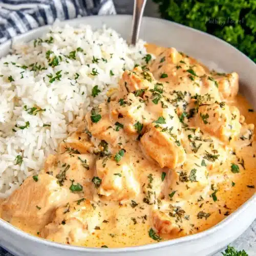 Delicious creamy smothered chicken and rice dish.