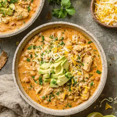 Delicious crockpot healthy white chicken chili with spices and chicken.