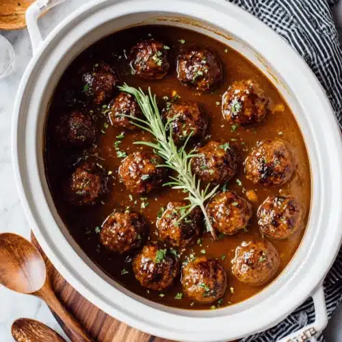Delicious slow cooker salisbury steak meatballs in creamy gravy.