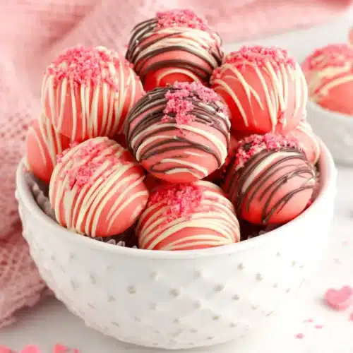 Delicious Strawberry No Bake Cake Balls topped with sprinkles.