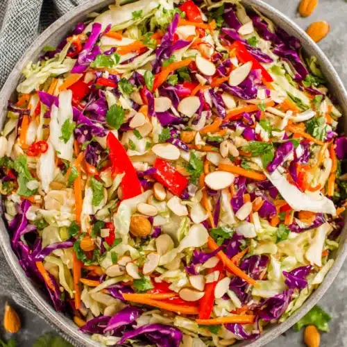 Colorful Asian Cabbage Salad, a blend of crisp veggies and zesty dressing.