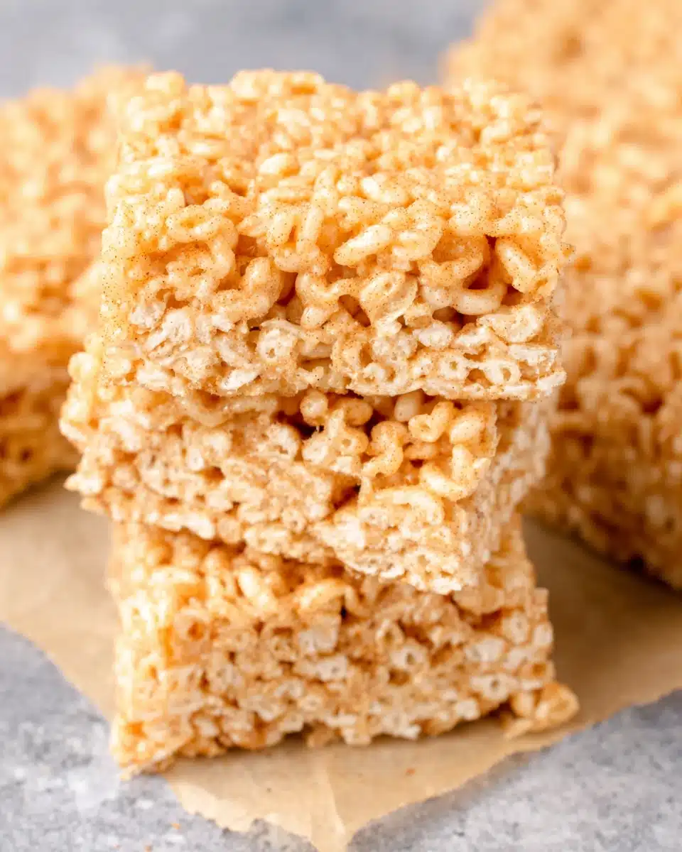 Churro Rice Krispie Treats stacked high for a sweet treat.