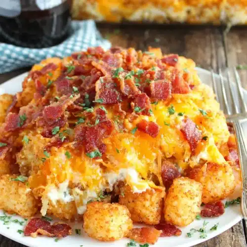 Delicious Cracked Out Tater Tot casserole with bacon and cheese.