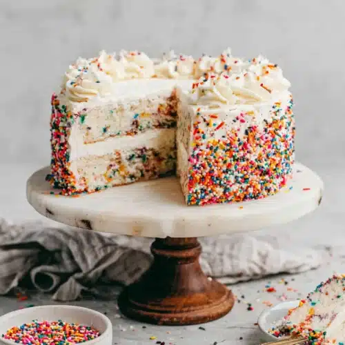 Delicious Funfetti Cake with vibrant sprinkles and smooth frosting.