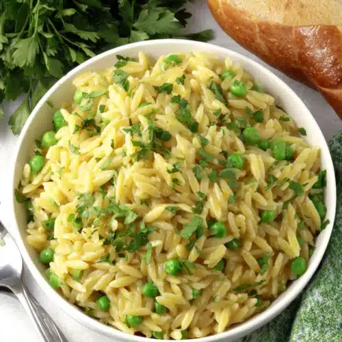 Delicious Parmesan Orzo and Peas side dish ready to serve.