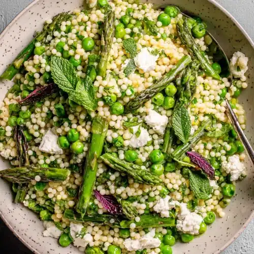 Healthy Easter Spring Couscous Salad with Feta full of vibrant fresh veggies.