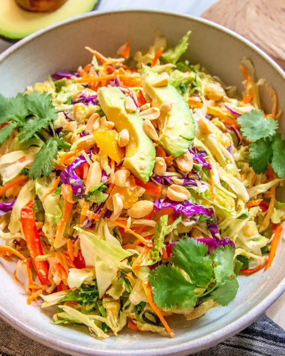 Fresh and vibrant shredded Thai salad with avocado, perfect for springtime.