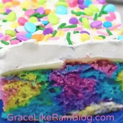A delicious Easter Poke Cake decorated with colorful frosting and festive toppings.
