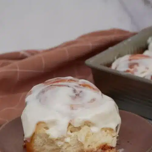 Deliciously fluffy sourdough discard cinnamon rolls topped with creamy icing