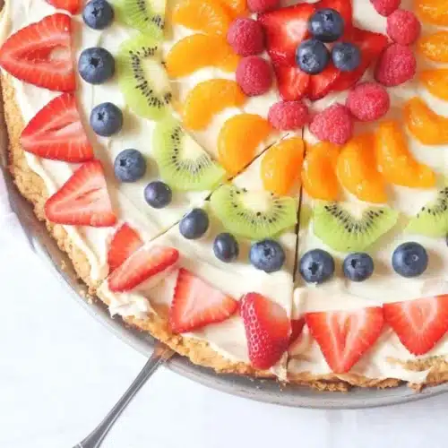 Sugar Cookie Fruit Pizza topped with colorful fresh fruits