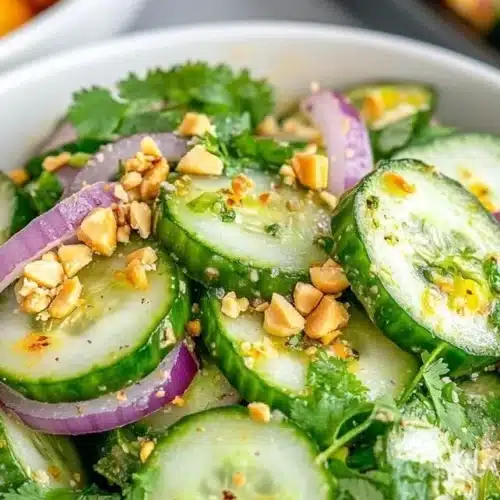 Colorful Thai Cucumber Salad with vegetables and dressing
