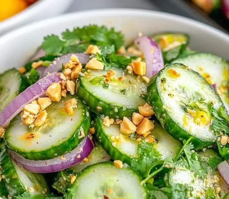 Colorful Thai Cucumber Salad with vegetables and dressing